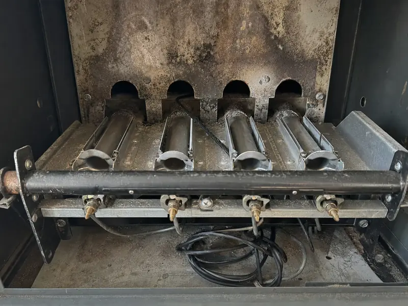 Borescope inspection through the burner ports of a propane furnace, the only reliable way to find a failing heat exchanger