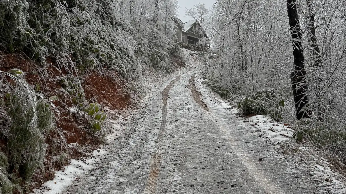 An iced-over mountain driveway in Pickens County, the condition that keeps propane trucks away for days at exactly the wrong time of year