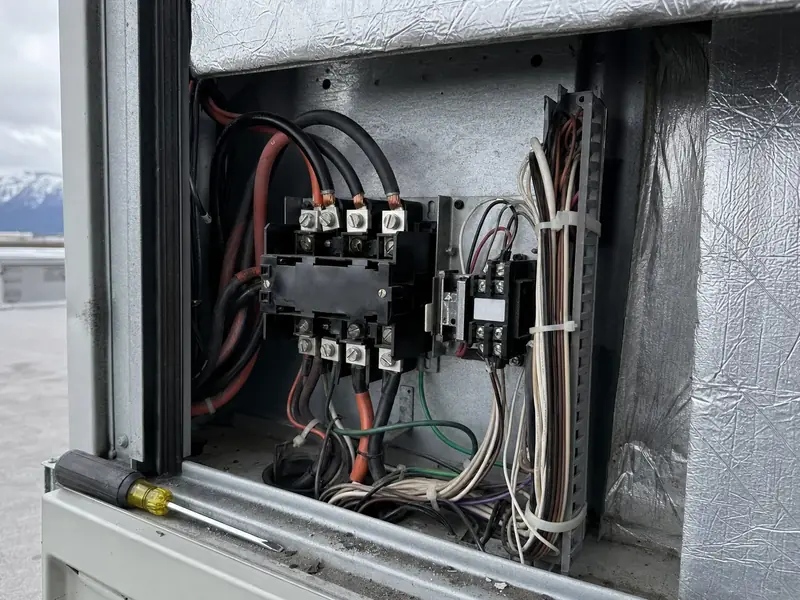 Conductor terminations and staging sequencer inside an air handler, the controls that keep resistance backup heat from running unnecessarily